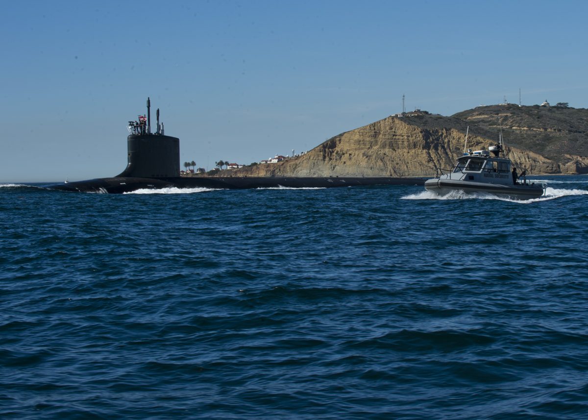 Virginia-class submarine departs San Diego, escorted by harbour patrol. US Navy photo, public domain.
